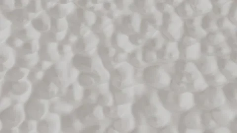 A smooth, neutral background texture featuring diffused light patterns in shades Stock Footage 340237596