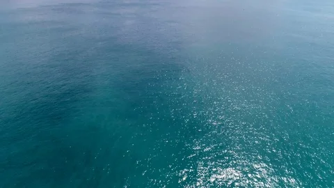 Smooth ocean with sun highlights Stock Footage 108721677