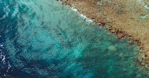 Smooth Ocean Surface Clean Water Aerial Background 4K Stock Footage 335649646