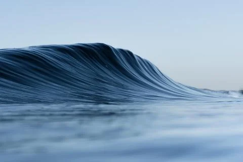 Smooth Ocean Wave Surface with Clean Blue Tones Stock Photos