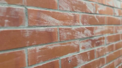 Smooth orange brick wall with dirt stains Stock Footage 312096631