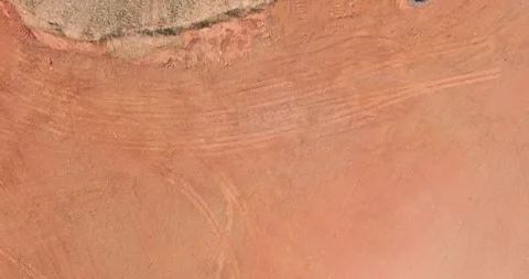 Smooth orange texture and subtle patterns on a wall during bright daylight hours Stock Footage 305567233