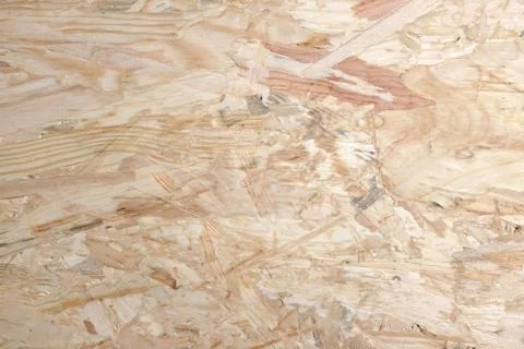 Smooth pale background of OSB - oriented strand board Stock Photos