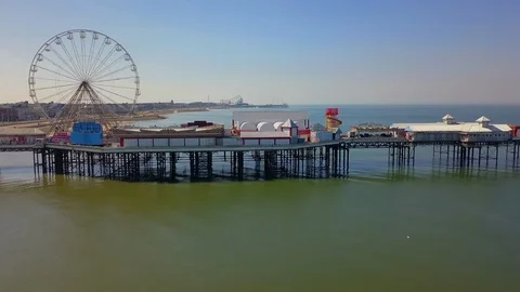 A smooth pan of the famous Central Pier in Blackpool, UK Stock Footage 92579204