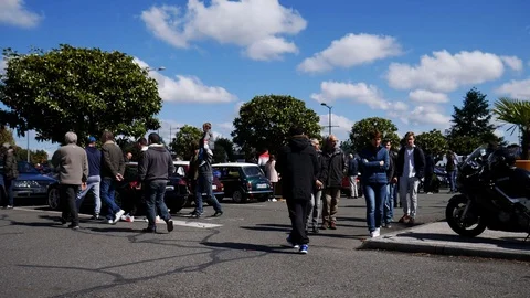 Smooth pan shot around a classic car show Stock Footage 107632889
