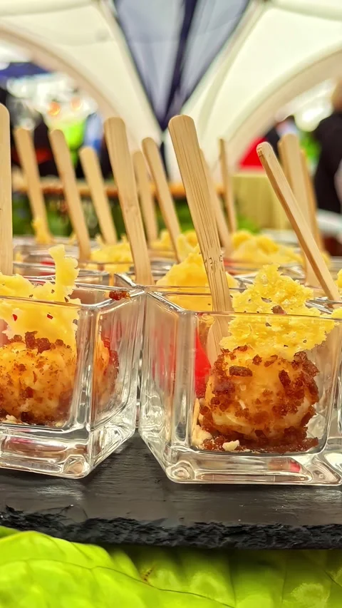 A smooth panning shot of elegant catering appetizers . Stock Footage 344527896
