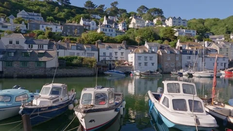 Smooth panoramic harbour shot of Polperro Cornwall fishing village Stock Footage 336032891