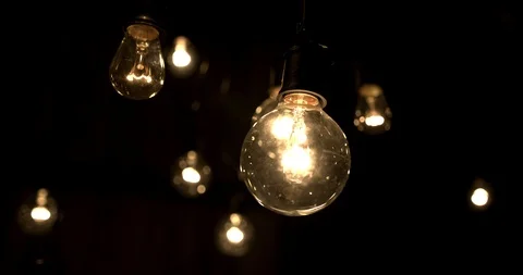 Smooth parallax of a string of lightbulbs Stock Footage 98366145