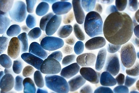 Smooth pebbles on beach Stock Photos