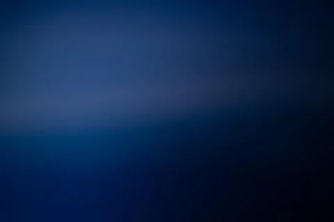 A smooth, rich blue gradient background with soft tonal transitions Stock Photos