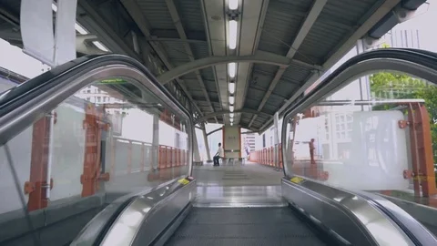 Smooth ride up empty escalator to station Stock Footage 81662297