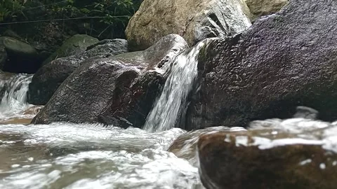 Smooth River Flow Over Rock Surface Calm Natural Scene Stock Footage 330582650