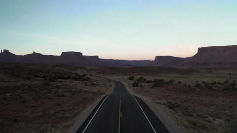Smooth road winding through incredible desert landscape in Utah Stock Footage 147580464