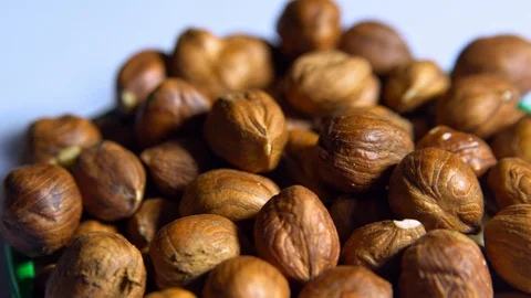 Smooth rotation of hazelnut kernels close-up Stock Footage 101498706