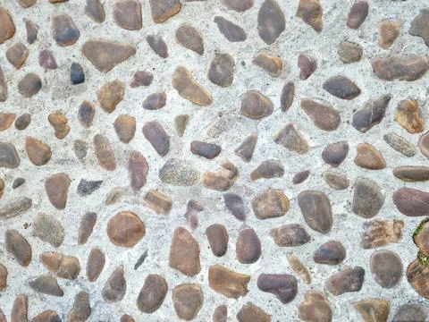 Smooth round stone texture background. pavement floor texture. multicolor t.. Stock Photos