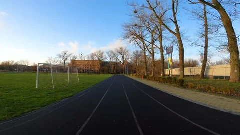 Smooth running on a running circle in the stadium Video stock 168701641