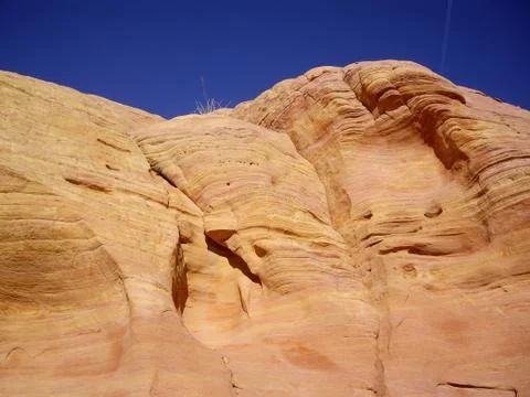 Smooth sandstone cliff Stock Photos