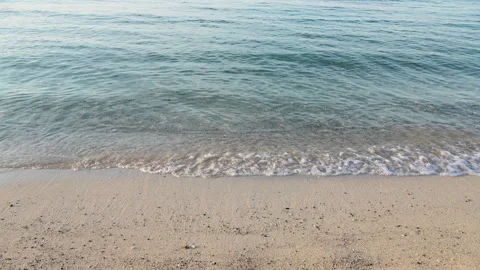 Smooth sea waves on sandy beach Stock-Footage 294833539