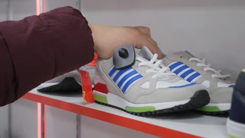 Smooth shoe rows on the shelves. Stock Footage 105604145