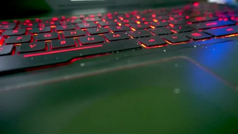 Smooth sideways slide movement capturing a macro close up view of a laptop .. Stock Footage 340490383