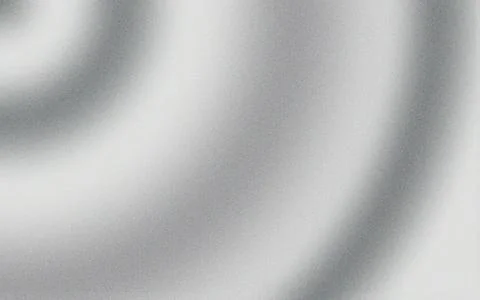 Smooth silver metallic gradient background with subtle light waves Stock Photos