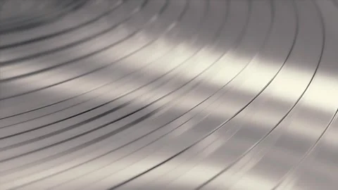 Smooth silver surface with curved glass rings reflecting light Stock Footage 344573567
