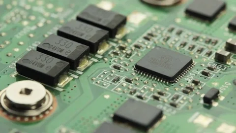 Smooth slide over the back side of an old obsolete green circuit board Video stock 72378466