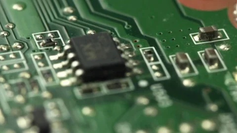 Smooth slide over the back side of an old obsolete green circuit board Stock Footage 72378750
