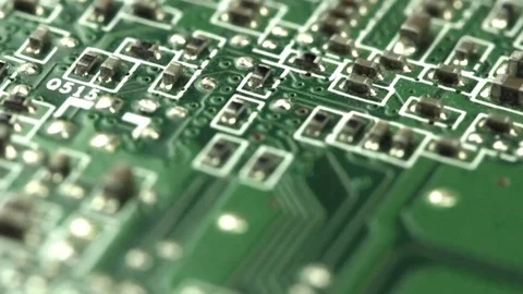 Smooth slide over the back side of an old obsolete green circuit board Stock Footage 72379008