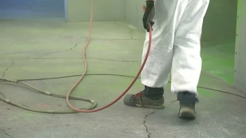 Smooth Slider Shot of Industrial Electrostatic Powder Coating Stock Footage 75291681
