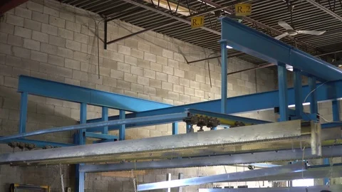 Smooth slider shot inside an industrial manufacturing company workshop Stock Footage 75291493