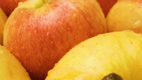 Smooth sliding close-up of glossy red apples. 스톡 동영상 313833337