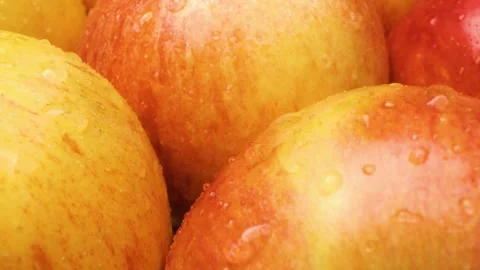 Smooth sliding close-up of glossy red apples Stock Footage 313833373