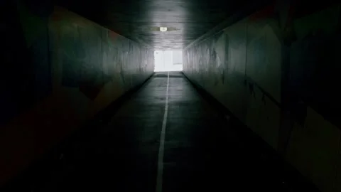 Smooth slowmotion walking through an Urban tunnel in Brisbane city  Stock Footage 268152220