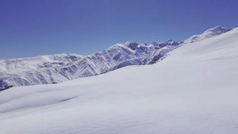 Smooth Snow Dunes Facing Andes Peaks Near Farellones Chile 4K Stock Footage 342765477