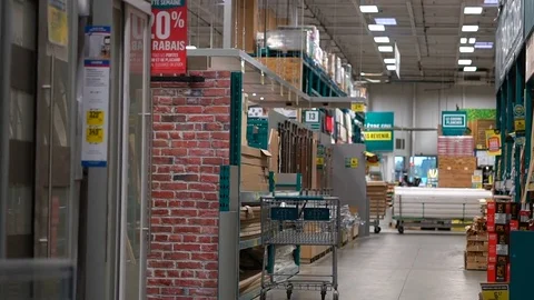 Smooth &amp; stabilized slow motion shot inside of a hardware store aisle Stock Footage 78614300