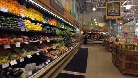Smooth Steadicam Shot At Organic Whole Foods Store Drink Veggies Aisle  Stock Footage