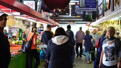 Smooth &amp; steady shot through farmer's market in a small town.  Stock Footage 80390909