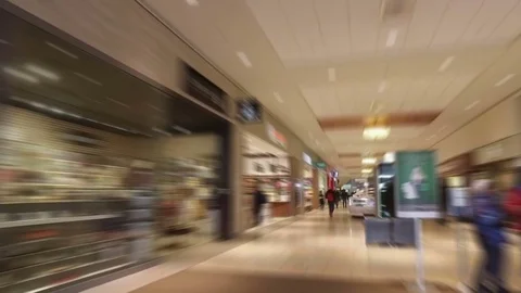  Smooth &amp; steady slow motion blurred walk-through shopping mall Stock Footage 71998960