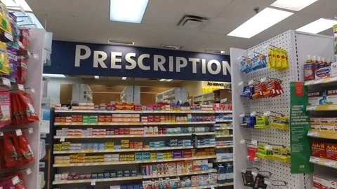 Smooth &amp; steady slow motion shot inside pharmacy 스톡 동영상 76143126
