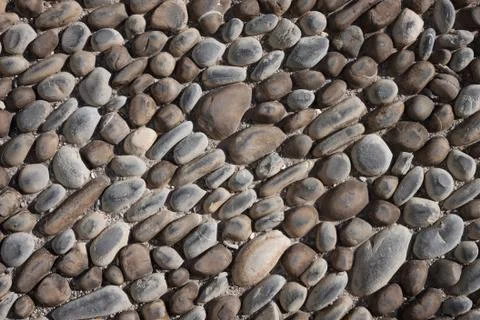 Smooth stones texture background Stock Photos