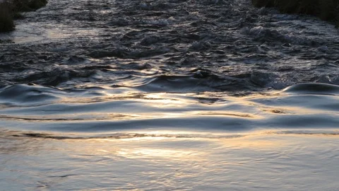 Smooth stream turns rough at sunset Stock Footage 91281960