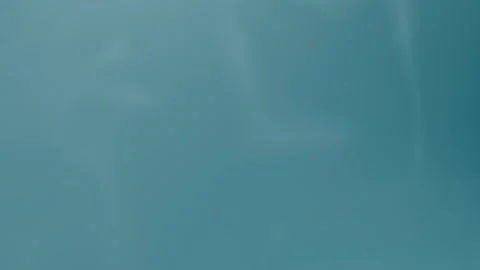 Smooth teal gradient background, seamless loop. 4K Stock Footage 309856091