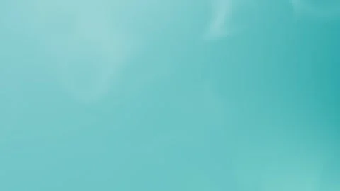 Smooth teal gradient seamless loop background. 4K video. Stock Footage 300840492