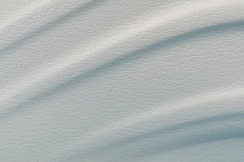 Smooth texture of light-colored material with subtle patterns Stock Photos