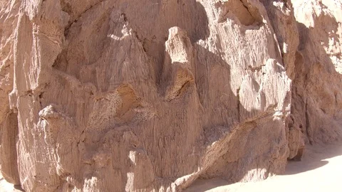 Smooth tilting up of a rock wall at Valle De La Luna desert Chile. Atacama Stock Footage 93848426