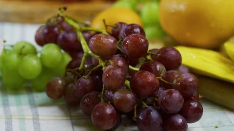 Smooth tracking, closeup shot across fresh fruit on kitchen counter Stock Footage 341232217