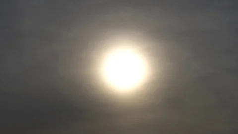 A smooth transition of the camera from the sun Sparkling on the water surface Video stock 75964052