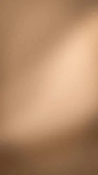 Smooth vertical beige copper gradient background with grainy texture ideal .. Stock Photos