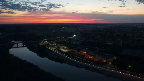 Smooth video from a copter, evening sunset over the city embankment Видео 201293641